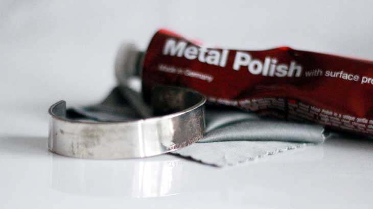 Photo of silver accessories cleaned with metal abrasive